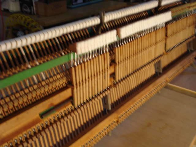 A26 Damper levers re-installed, new damper felts glued on damper blocks A26 Damper levers re-installed, new damper felts glued on damper blocks